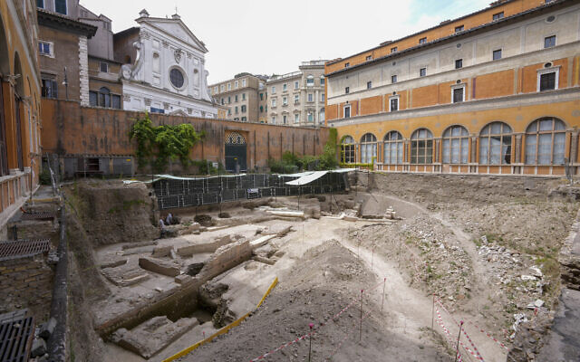 People walk in the excavation site of the ancient Roman emperor Nero's theater, 1st century AD, backdropped by the church of Santo Spirito in Sassia, during a press preview, in Rome, Wednesday, July 26, 2023 (AP Photo/Andrew Medichini) People walk in the excavation site of the ancient Roman emperor Nero's theater, 1st century AD, backdropped by the church of Santo Spirito in Sassia, during a press preview, in Rome, Wednesday, July 26, 2023 (AP Photo/Andrew Medichini)