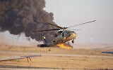 An Israeli Air Force UH-60 Black Hawk flies during a demonstration at a graduation ceremony for new IAF pilots, at the Hatzerim Air Base in the Negev desert, June 29, 2023. (Emanuel Fabian/Times of Israel)