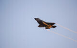 An F-35i jet maneuvers during a graduation ceremony for new IAF pilots, at the Hatzerim Air Base in the Negev desert, June 29, 2023. (Emanuel Fabian/Times of Israel)