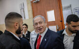Prime Minister Benjamin Netanyahu seen at the Jerusalem District Court for the testimony of businessman Arnon Milchan in the premier's corruption trial, July 6, 2023. (Chaim Goldberg/Flash90)