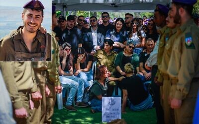 Mourners at the funeral of Staff Sgt. Shilo Yosef Amir (inset) at the Mount Herzl military cemetery in Jerusalem, on July 7, 2023. (Chaim Goldberg/Flash90)