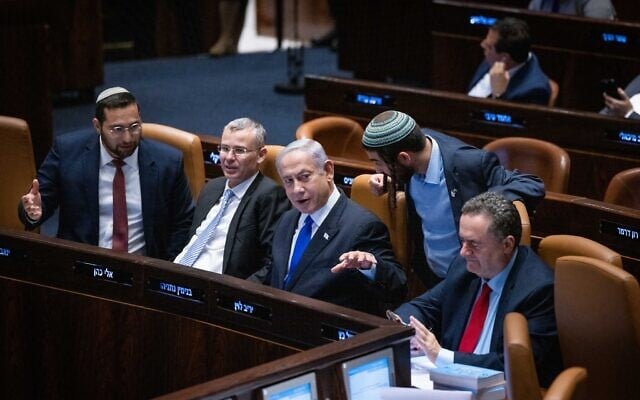 Prime Minister Benjamin Netanyahu at a plenum session in the Knesset in Jerusalem on July 10, 2023, as lawmakers deliberate a bill to constrict the judiciary’s review powers over the 'reasonableness' of government decisions. (Yonatan Sindel/Flash90) Prime Minister Benjamin Netanyahu at a plenum session in the Knesset in Jerusalem on July 10, 2023, as lawmakers deliberate a bill to constrict the judiciary’s review powers over the 'reasonableness' of government decisions. (Yonatan Sindel/Flash90)