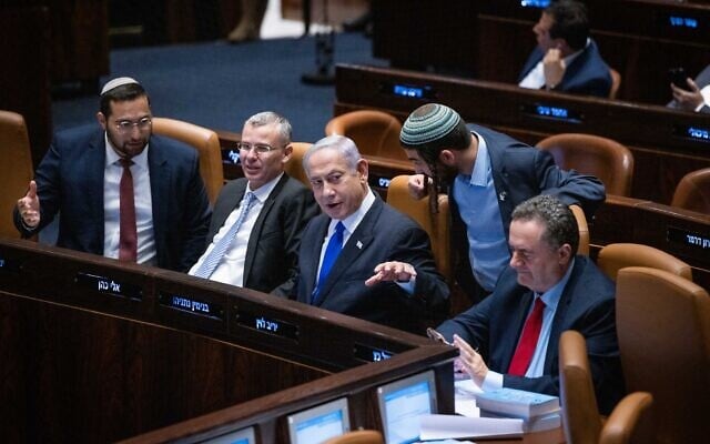 Prime Minister Benjamin Netanyahu (C) and other coalition members at the Knesset on July 10, 2023. (Yonatan Sindel/Flash90) Prime Minister Benjamin Netanyahu (C) and other coalition members at the Knesset on July 10, 2023. (Yonatan Sindel/Flash90)