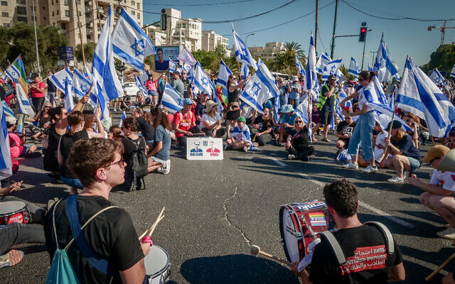 Demonstrators protest against the judicial overhaul in Tel Aviv, July 11, 2023 (Avshalom Sassoni/Flash90) Demonstrators protest against the judicial overhaul in Tel Aviv, July 11, 2023 (Avshalom Sassoni/Flash90)