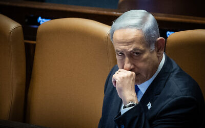 Prime Minister Benjamin Netanyahu attends a vote on the reasonableness bill at the Knesset on July 24, 2023 after being fitted with a pacemaker. (Yonatan Sindel/Flash90)