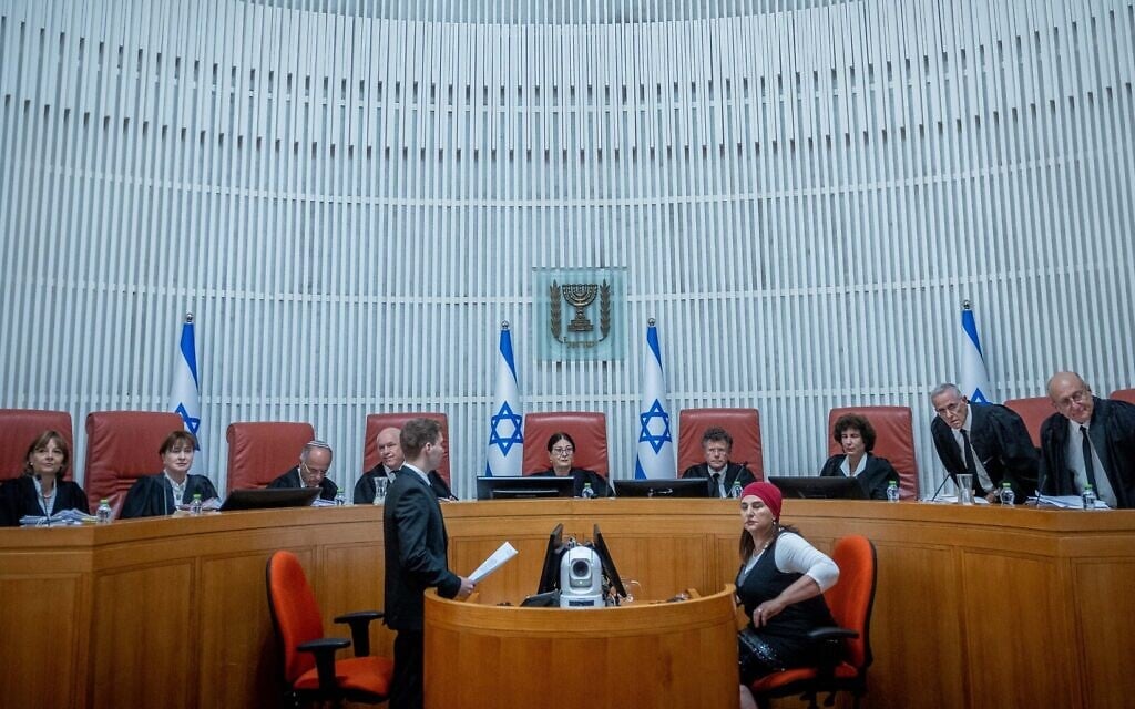 President of the Supreme Court Esther Hayut and Supreme Court justices at the High Court in Jerusalem hear petitions against the so-called 'Tiberias law,' on July 30, 2023. (Yonatan Sindel/Flash90) President of the Supreme Court Esther Hayut and Supreme Court justices at the High Court in Jerusalem hear petitions against the so-called 'Tiberias law,' on July 30, 2023. (Yonatan Sindel/Flash90)