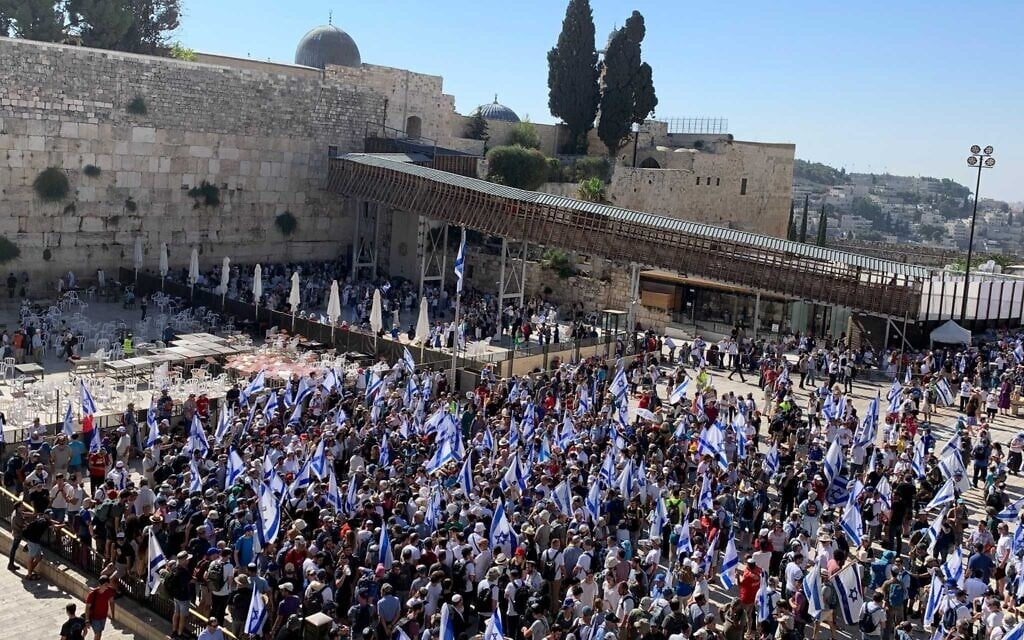 Pro- and anti-overhaul demonstrators hold prayers at the Western Wall, in Jerusalem, July 23, 2023. (Charlie Summers/The Times of Israel)