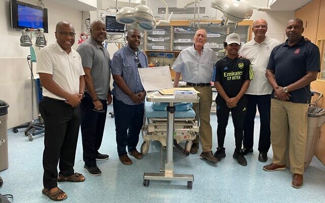 Shock trauma specialist Prof. Avi Rivkind (center right) with members of a delegation from the Thurgood Marshall College Fund and Historically Black Colleges and Universities, Hadassah Medical Center, Jerusalem, July 13, 2023. (Renee Ghert-Zand/Times of Israel)