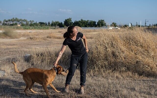 Nitzan Tal with rescue dog Paige during an exercise as part of Project Locate, spring of 2023. (Shanie Roth Photography)