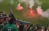 Flares fired onto the pitch at a soccer game between Maccabi Haifa and the Hamrun Spartans at Centenary Stadium in Malta, July 11, 2023. (Twitter video screenshot: used in accordance with Clause 27a of the Copyright Law)