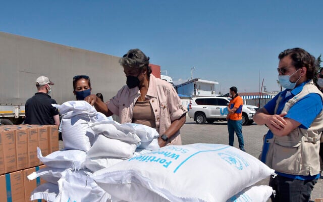 Linda Thomas-Greenfield, U.S. Ambassador to the United Nations, examines aid materials at the Bab al-Hawa border crossing between Turkey and Syria, June 3, 2021. (US Embassy in Turkey via AP, File)