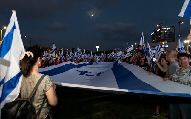 Israelis demonstrate against the government's planned judicial overhaul, in Netanya on July 1, 2023 (Ziv Oren)