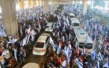 Israelis protest against plans by Prime Minister Benjamin Netanyahu's government to overhaul the judicial system, at Ben Gurion Airport near Tel Aviv, July 3, 2023. (Amir Goldstein)