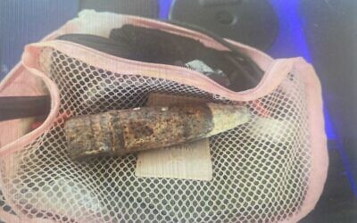 An anti-aircraft bullet found in the bag of an IDF soldier as she entered Tel Aviv's Savidor station, July 16, 2023. (Israel Police)
