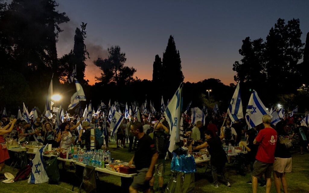 An encampment at Kibbutz Nahshon at the end of day 3 of an anti-overhaul march to Jerusalem, leading into a 'Festival of Democracy' celebration featuring food and music, July 20, 2023. (Charlie Summers/Times of Israel)