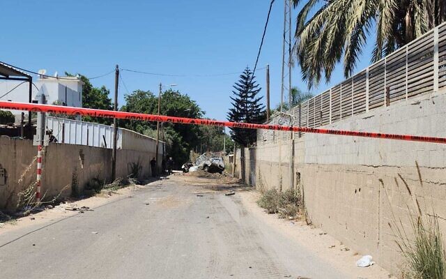 This handout photo shows the scene of a car explosion in the central city of Lod, July 26, 2023. (Israel Police) This handout photo shows the scene of a car explosion in the central city of Lod, July 26, 2023. (Israel Police)