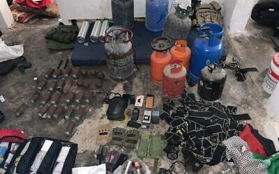 Illustrative: Explosives and other weapons located by Israeli forces in the West Bank city of Jenin, July 4, 2023. (Israel Defense Forces)