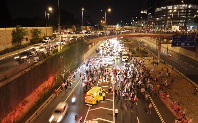 An ambulance at the scene on Highway 531 where a driver rammed into demonstrators, July 24, 2023. (Dov Gazit) An ambulance at the scene on Highway 531 where a driver rammed into demonstrators, July 24, 2023. (Dov Gazit)
