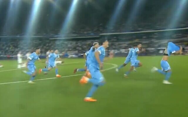 Israel's Under-21 soccer team reacts upon winning a semifinal spot in the European Championship by beating Georgia in a penalty shootout, on July 1, 2023 (Video screenshot; used in accordance with Clause 27a of the Copyright Law) Israel's Under-21 soccer team reacts upon winning a semifinal spot in the European Championship by beating Georgia in a penalty shootout, on July 1, 2023 (Video screenshot; used in accordance with Clause 27a of the Copyright Law)