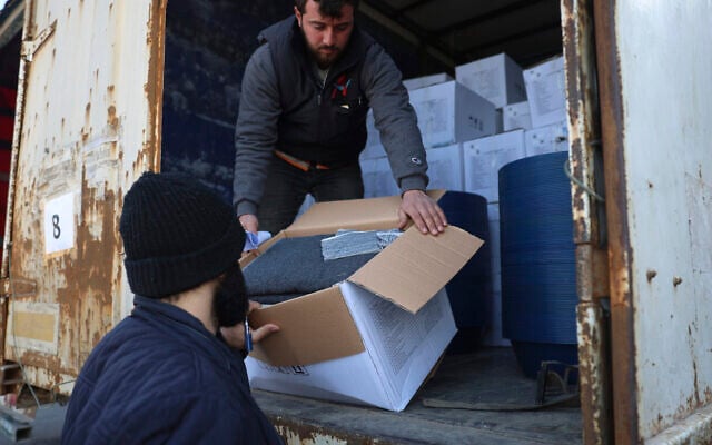 Border customs officials inspect a truck loaded with United Nations humanitarian aid for Syria at the Bab al-Hawa border crossing with Turkey, in Syria's Idlib province, following a devastating earthquake, on February 10, 2023. (AP Photo/Ghaith Alsayed, File) Border customs officials inspect a truck loaded with United Nations humanitarian aid for Syria at the Bab al-Hawa border crossing with Turkey, in Syria's Idlib province, following a devastating earthquake, on February 10, 2023. (AP Photo/Ghaith Alsayed, File)