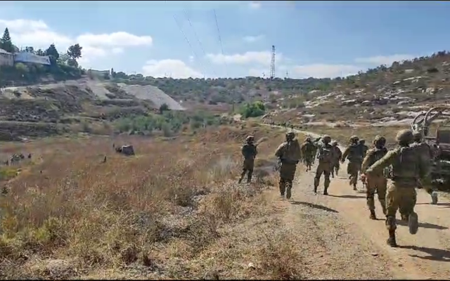 IDF soldiers at the site of a shooting attack near the West Bank settlement of Kedumim on July 6, 2023. (Courtesy) IDF soldiers at the site of a shooting attack near the West Bank settlement of Kedumim on July 6, 2023. (Courtesy)