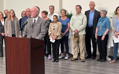 Rabbi Jeffrey Myers leads survivors and families of the attack on the Tree of Life synagogue in a prayer of thanks, at the Jewish Community Center in Pittsburgh, August 2, 2023. (Ron Kampeas/JTA)