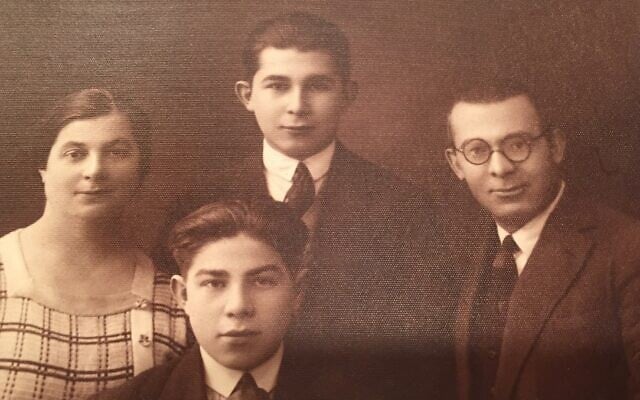 Reuben Efron, back center, poses with his brother Irving Effron, below center and his mother and his uncle in an undated photo. (Courtesy Barry Effron/ via JTA)