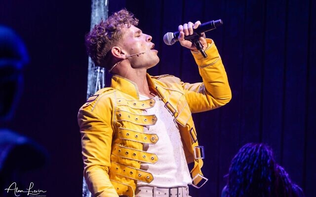 Stuart Brown as Galileo in 'We Will Rock You," the Queen musical onstage at Tel Aviv's Opera House through September 14, 2023 (Courtesy Alon Levin)