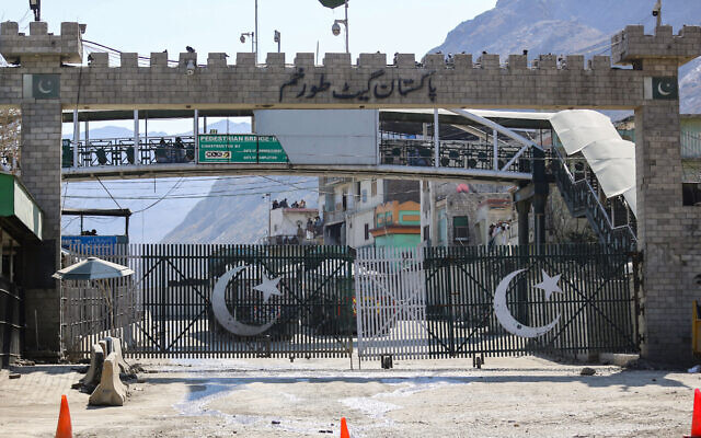 Illustrative: The closed Torkham gate is seen from the zero point at the Torkham border crossing between Afghanistan and Pakistan, in Nangarhar province on February 23, 2023. (Shafiullah KAKAR/AFP) Illustrative: The closed Torkham gate is seen from the zero point at the Torkham border crossing between Afghanistan and Pakistan, in Nangarhar province on February 23, 2023. (Shafiullah KAKAR/AFP)