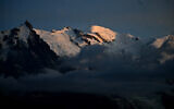 This picture taken on July 30, 2023, shows the Mont Blanc at sunset above Chamonix, Haute-Savoie, France. (Emmanuel Dunand/AFP)