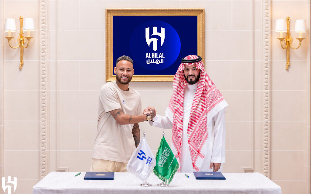 File: Brazilian forward Neymar (L) poses for a picture with Hilal President Fahad bin Nafel in Paris, France, on August 15, 2023. (Saudi Pro League/AFP) File: Brazilian forward Neymar (L) poses for a picture with Hilal President Fahad bin Nafel in Paris, France, on August 15, 2023. (Saudi Pro League/AFP)