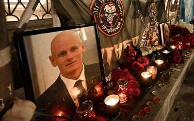 A portrait of Dmitry Utkin, a shadowy figure who managed Wagner's operations and allegedly served in Russian military intelligence, is seen at the makeshift  memorial in Moscow, on August 24, 2023.(Natalia Kolesnikova/AFP)