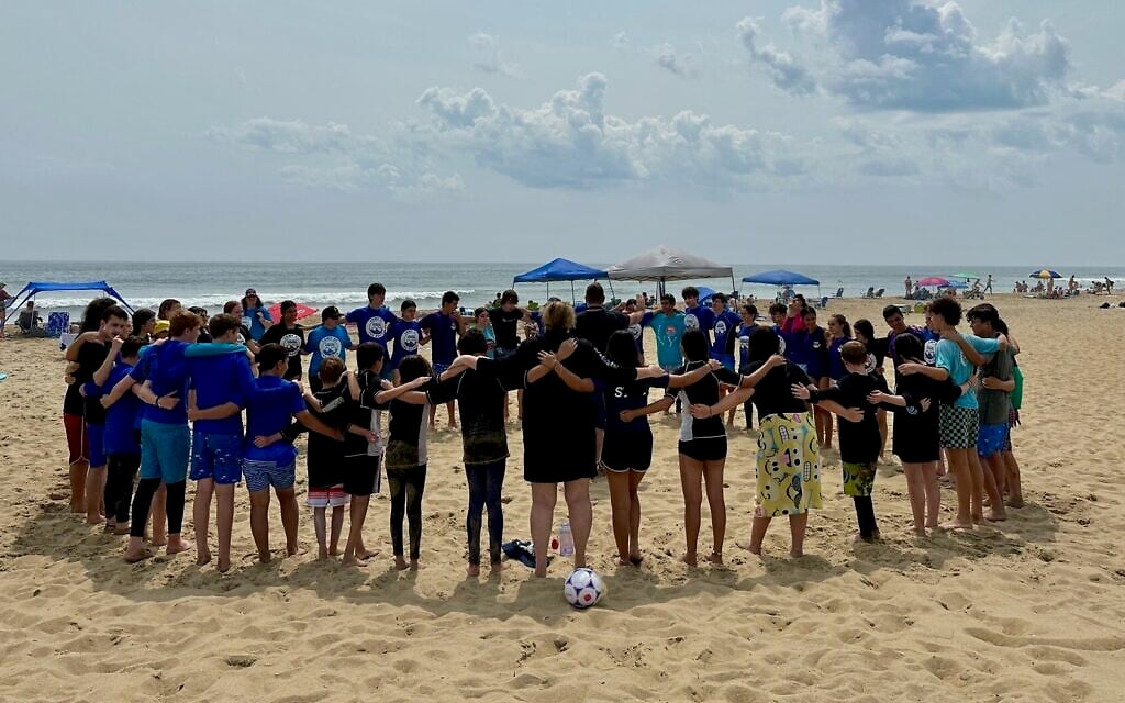 Sababa Beachaway campers sing Mah Tovu at Sandbridge Beach in Virginia Beach, Virginia. (Jacob Gurvis/ JTA)