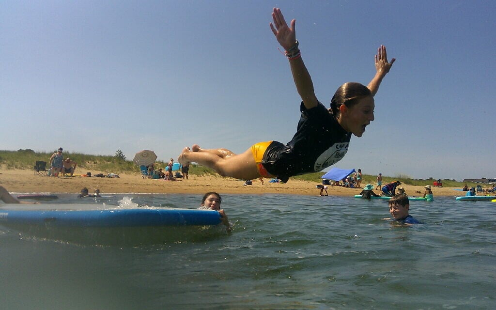 Campers surfing at Sababa Beachaway. (Courtesy of Sababa via JTA)