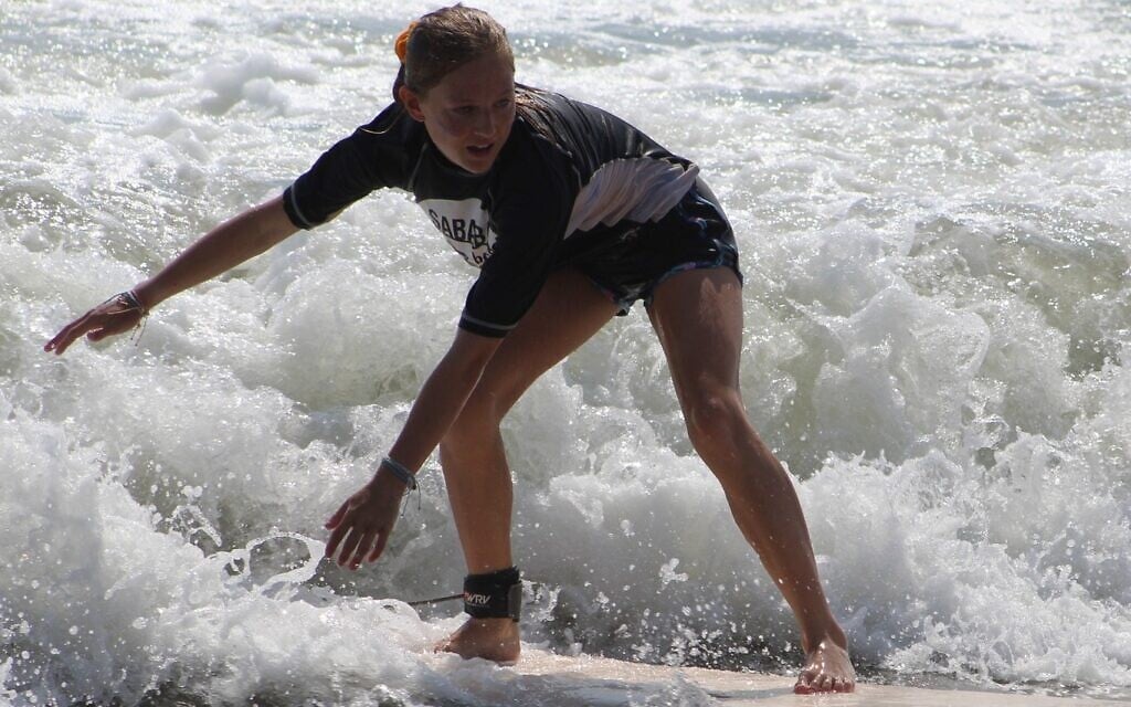 Campers surfing at Sababa Beachaway. (Courtesy of Sababa via JTA)