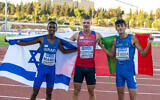 Mamu Noam of Israel, Jakub Dudycha of the Czech Republic and Davide De Rosa of Italy celebrate after the men's 800 meter event during the 2022 European Athletics U18 Championships at Givat-Ram Stadium in Jerusalem, July 7, 2022. (Jurij Kodrun/Getty Images for European Athletics via JTA)