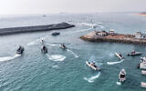 In this photo released on August 2, 2023, by Sepahnews of the Iranian Revolutionary Guard, the Guard's speedboats participate during a drill in the Persian Gulf. (Sepahnews via AP)