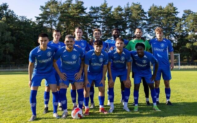 The Makkabi Berlin team pose for a photo before a practice match, in Berlin, Germany, on July 26, 2023. (AP Photo/ Ciaran Fahey)