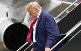 Former US president Donald Trump arrives at Ronald Reagan Washington National Airport in Arlington, Virginia, August 3, 2023. (AP Photo/Alex Brandon)