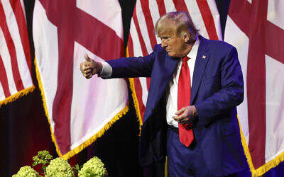 Former US president Donald Trump gestures after speaking at a fundraiser event for the Alabama GOP, Friday, Aug. 4, 2023, in Montgomery, Ala. (AP Photo/Butch Dill)
