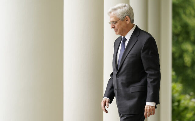 Attorney General Merrick Garland arrives with President Joe Biden for an event in the Rose Garden of the White House in Washington, May 13, 2022.(AP Photo/Andrew Harnik, File)