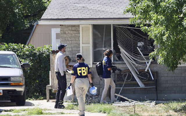 Law enforcement investigate the scene of a shooting involving the FBI, Aug. 9, 2023 in Provo, Utah. (Laura Seitz/The Deseret News via AP) Law enforcement investigate the scene of a shooting involving the FBI, Aug. 9, 2023 in Provo, Utah. (Laura Seitz/The Deseret News via AP)