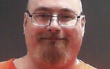 This photo released August 10, 2023, by the West Virginia Division of Corrections and Rehabilitation shows Hardy Carroll Lloyd, 45, of Follansbee, West Virginia. (West Virginia Division of Corrections and Rehabilitation via AP)