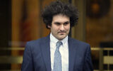 FILE — FTX founder Sam Bankman-Fried leaves Manhattan federal court in New York, February 16, 2023. (AP Photo/John Minchillo, File)