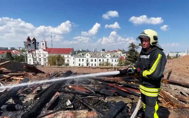 Firefighters work on a roof of the Taras Shevchenko Chernihiv Regional Academic Music and Drama Theatre damaged by a Russian attack in Chernihiv, Ukraine, August 19, 2023. (Ukrainian Emergency Service via AP) Firefighters work on a roof of the Taras Shevchenko Chernihiv Regional Academic Music and Drama Theatre damaged by a Russian attack in Chernihiv, Ukraine, August 19, 2023. (Ukrainian Emergency Service via AP)