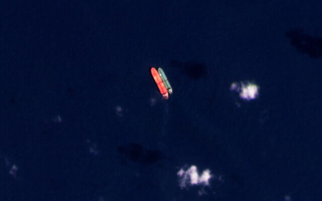File: Vessels identified as the Virgo, left, and the Suez Rajan, by the advocacy group United Against Nuclear Iran, are seen in the South China Sea on February 13, 2022. (Planet Labs PBC via AP) File: Vessels identified as the Virgo, left, and the Suez Rajan, by the advocacy group United Against Nuclear Iran, are seen in the South China Sea on February 13, 2022. (Planet Labs PBC via AP)
