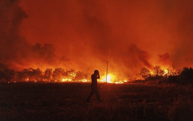 Flames burn a forest during a wildfire in Avantas village, near Alexandroupolis town, in the northeastern Evros region, Greece, Monday, Aug. 21, 2023. (AP Photo/Achilleas Chiras) Flames burn a forest during a wildfire in Avantas village, near Alexandroupolis town, in the northeastern Evros region, Greece, Monday, Aug. 21, 2023. (AP Photo/Achilleas Chiras)