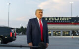 Former US president Donald Trump speaks with reporters before departure from Hartsfield-Jackson Atlanta International Airport, August 24, 2023, in Atlanta. (AP/Alex Brandon, File)