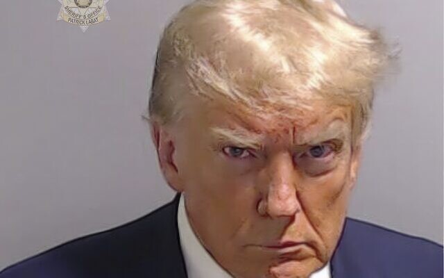 This mug shot provided by the Fulton County Sheriff's Office shows Donald Trump on Wednesday, August 24, 2023, in Atlanta, after he was briefly booked. (Fulton County Sheriff's Office) This mug shot provided by the Fulton County Sheriff's Office shows Donald Trump on Wednesday, August 24, 2023, in Atlanta, after he was briefly booked. (Fulton County Sheriff's Office)