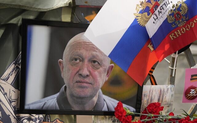 A portrait of the owner of private military company Wagner Group Yevgeny Prigozhin lays at an informal street memorial near the Kremlin in Moscow, Russia, August 26, 2023. (AP Photo/Alexander Zemlianichenko) A portrait of the owner of private military company Wagner Group Yevgeny Prigozhin lays at an informal street memorial near the Kremlin in Moscow, Russia, August 26, 2023. (AP Photo/Alexander Zemlianichenko)